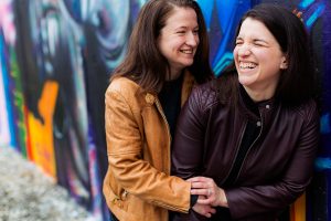 LGBTQ couple laughs together in DC.