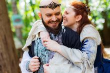 Bride and groom share an intimate moment at their MD Renn Fest wedding.