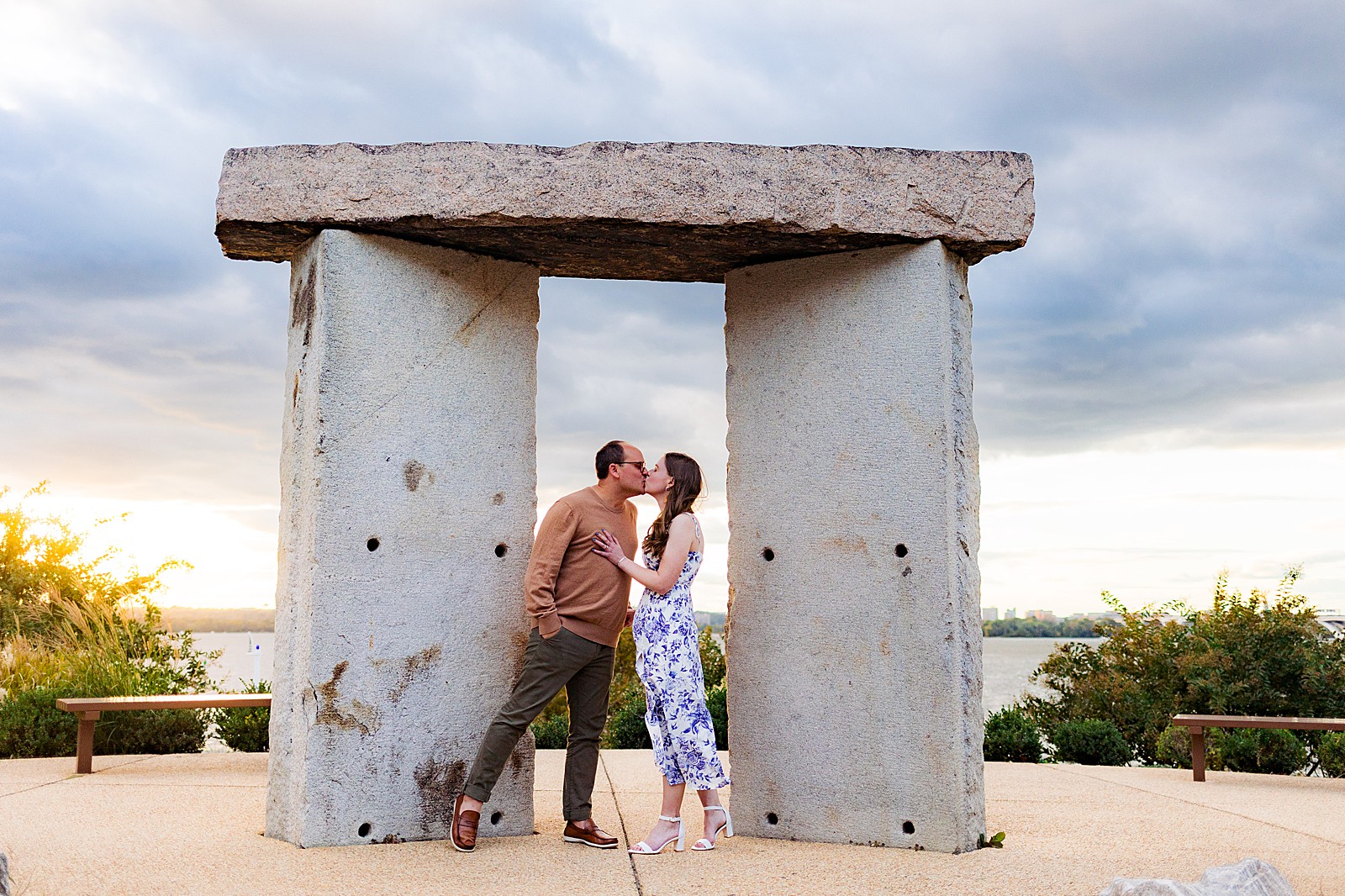 National Harbor couple kisses during their engagement session. 