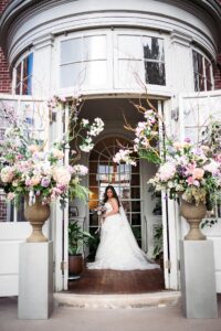 Bride poses for a portrait before her micro wedding at the Woodrow Wilson House in DC.